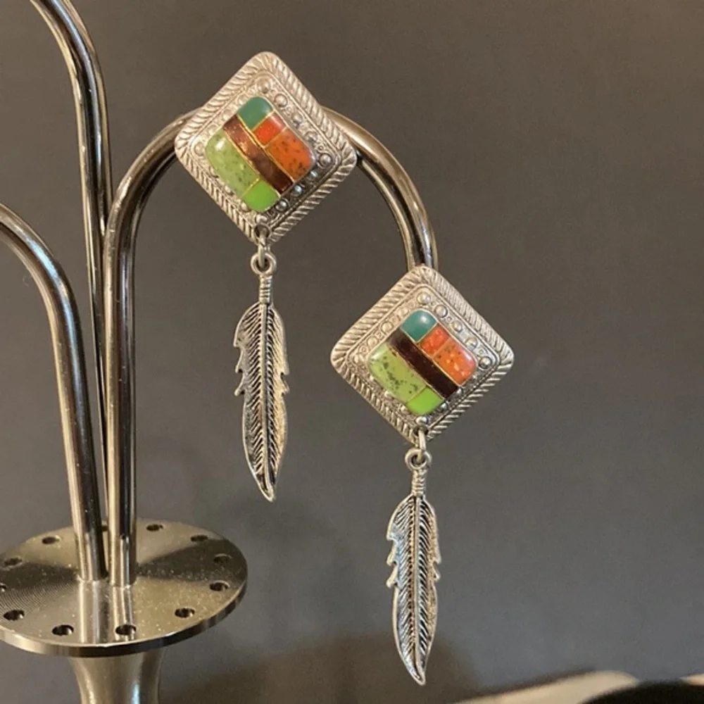 Silver tone and enamel drop feather earrings